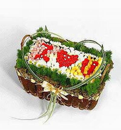 Flowers and Roses spelling I Luv U within a wooden basket (wooden baskets may vary in style, shape and size.)