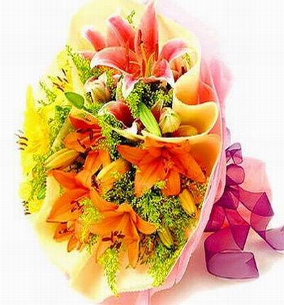 Simple Lily mix of 5 orange tiger Lilies, 3 pink Lilies and greens in pink wrapping