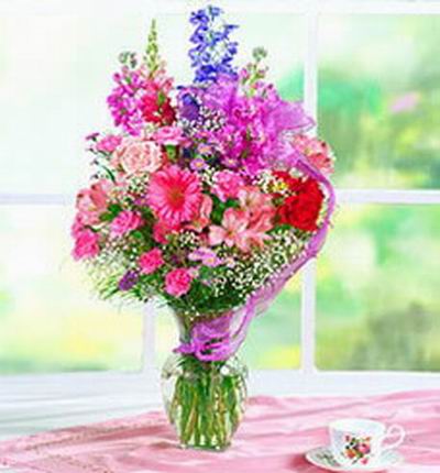 pink Chrysanthemum,pink Carnations,purple & pink Stocks,red Roses and babybreath