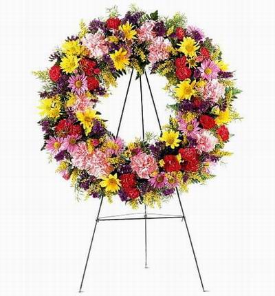 Wreath Shaped Stand with Daisies, Carnations and Greenery fillers.