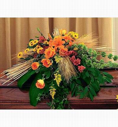 Arrangement of Roses, Lilies, Daisies and fillers.