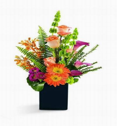 Peach roses, orange Mokara orchids and Gerbera daisies, hot pink mini callas and asters