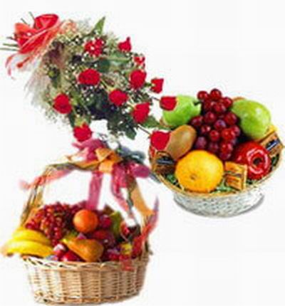 Red Roses in plastic wrapping and two fruit baskets