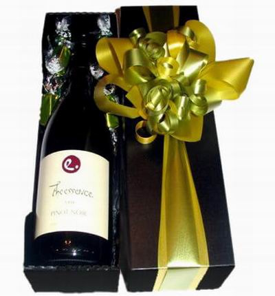 Wine and Candies in box. Wine based on local wine selection. Brands will vary.  (Photo image is only an example)