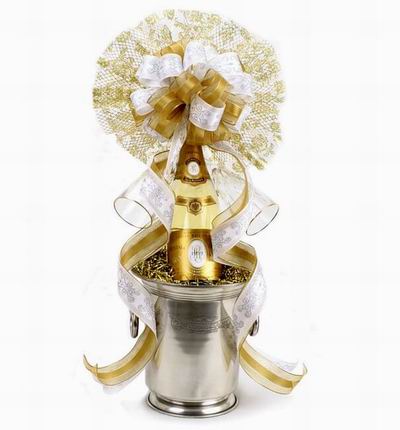 Champagne Bottle (bucket and bow design is only an example. Item will be wrapped nicely). Champagne based on local selection. Brands will vary.  (Photo image is only an example)