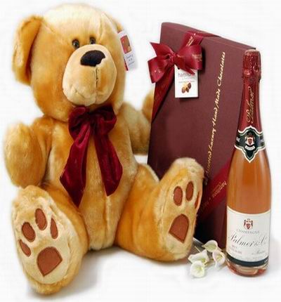 Champagne,a box of chocolates, and a 30 cm teddy bear