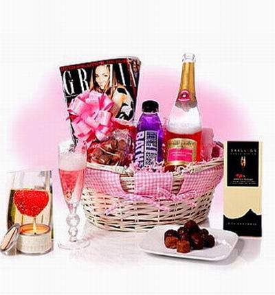 Seagram's Wine Cooler, Bath Foam, Chocolates in basket. (Magazine not included). Wine cooler and items based on local selection. Brands will vary.  (Photo image is only an example)