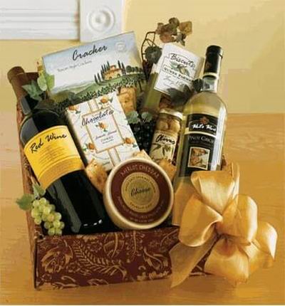 Red and white wine bottles, Cheese, Crackers, Olives, Biscuts and Chocolates.
