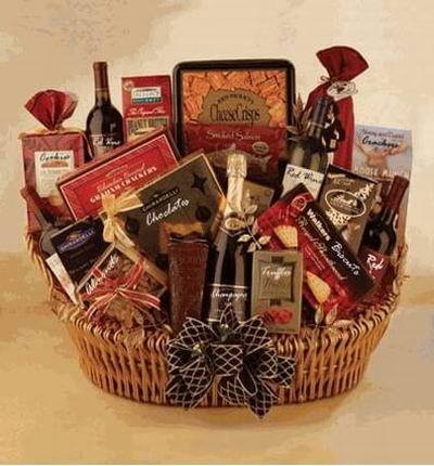 Basket of four red wine bottles, one bottle of Champagne, Biscuts, Chocolates, Almonds, Chocolate Truffles, Ghiradelli Chocolates, two boxes of crackers.