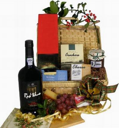 1 bottle of red wine, Cheese, Crackers, Fruit Jam. Wine based on local wine selection. Brands will vary.  (Photo image is only an example)