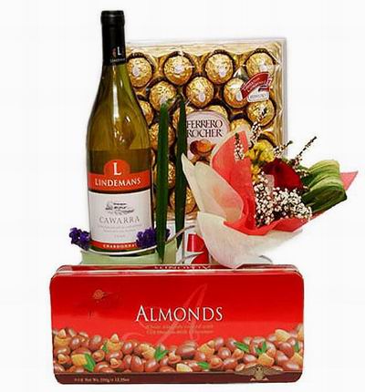White wine, 24 Ferrero Chocolates, Almond chocolates and mini flower bouquet.