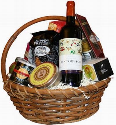 Red wine, Pretzels, Cashew nuts Olives, Cheese, Crackers. Wine based on local wine selection. Brands will vary.  (Photo image is only an example)