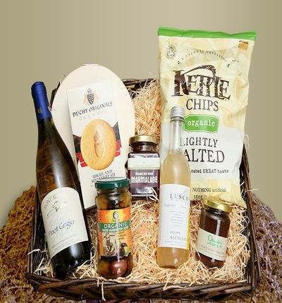 Bottle of white wine and juice, Organic mix of lightly salted Kettie chips, shortbread, mixed marinated olives and black olives. (based on availability, if the organic items are not available, it will be substituted with regular non-organic items). Wine based on local wine selection. Brands will vary.  (Photo image is only an example)