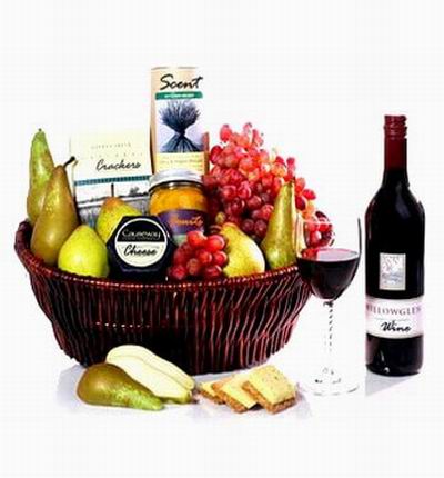 Fruit Basket with 1 bottle of red Wine, 6 Pears, Cheese, Crackers, Bottle Fruits and Scent sticks.