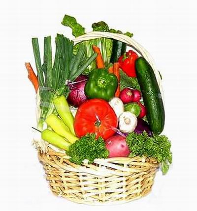 Basket of Vegetables. 1 green Bell Pepper, 1 red Bell Pepper, 2 Cucumber, 1 Potato, 1 Onion, 4 Carrot sticks, Green Onions, 3 Peppers, 3 Mushrooms, 3 Radish, 1 Tomato, 2 bunches of Parsley.
