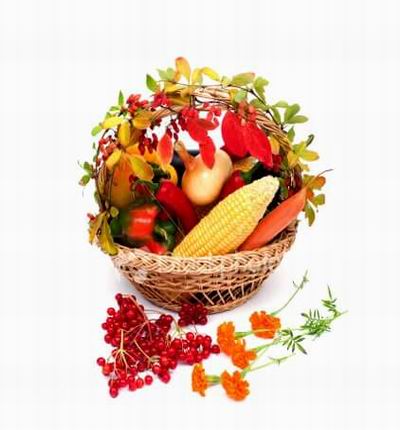 Basket of Vegetables. 1 Corn on the Cob, 1 Carrot stick, 1 Onion, 2 red Peppers, 1 Squash, 1 Bell Pepper and with leave fillers on the handle.