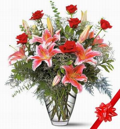 4 stem pink lilies (6 open buds), 6 red roses and green