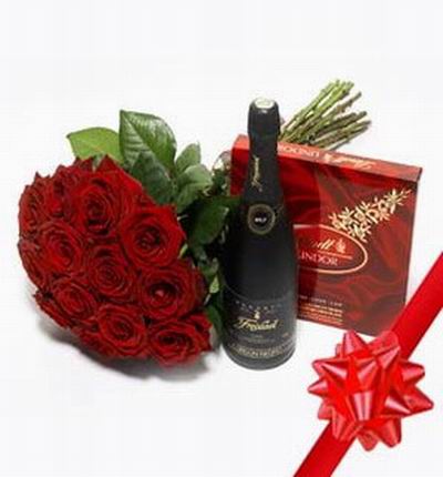 12 Roses with Lindt Chocolates and a bottle of champagne.  The box of chocolates may vary based on availability.