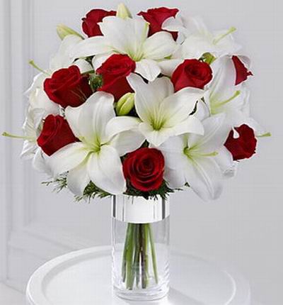 9 Red roses, 9 white Oriental lilies.