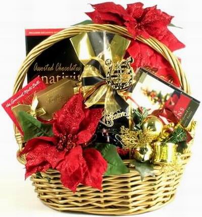 A basket of Truffles, Chocolate Malt Balls, Assorted Chocolates and Christmas plant fillers.