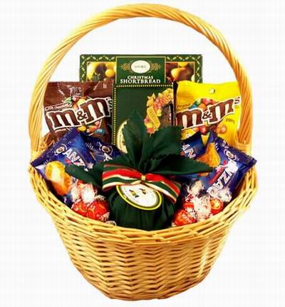 A basket of M&Ms, Shortbread, two bags of chips, Chocolates and Assorted Candies.