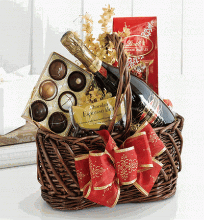 A simple basket of red Wine, Chocolates, Expresso Beans, and Lindor Truffles.