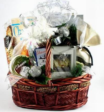 A basket of Cheese, Crackers, Toasted Bread, biscuits, bakery goods,   and Chocolates.