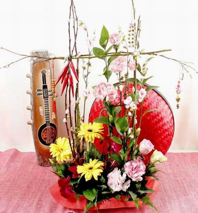 Lunar New Year floral mix of Gerbera Daisies, Eustomas and Roses.
