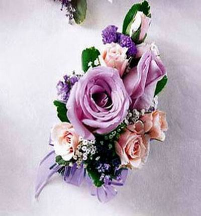 4 pink Roses,2 purple Roses and  Statice mix display