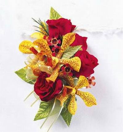 red Roses and yellow Callas mix display