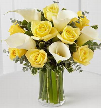 8 Yellow roses and 5 Calla lilies