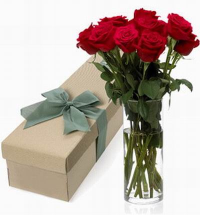 12 long stem imported roses in rectangular box and add vase to order.