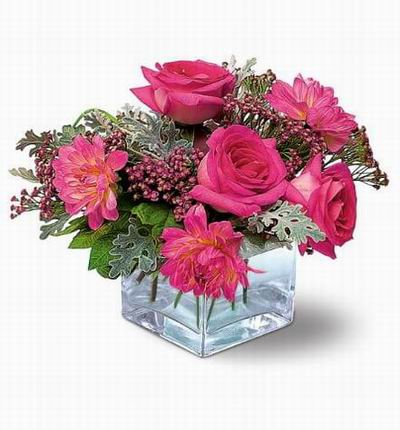 3 pink Roses and 3 Globeflowers with fillers. Globeflowers may be substituted with Carnations if unavailable.