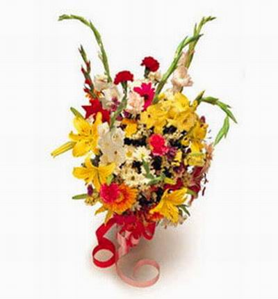 Yellow Lilies,red,yellow & white Chrysanthemums,red & white Carnations,white & pink gladiolus