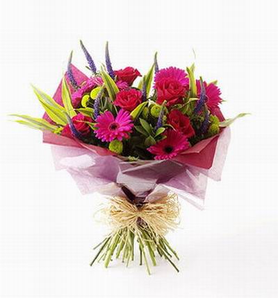 5 red Roses, 5 pink/violet Gerbera Dasies and designed greenery.