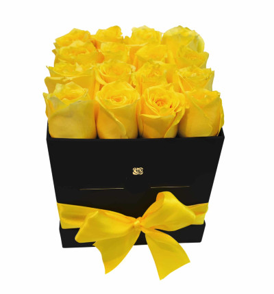 16 yellow roses in black box. If boxes are not available, please let us know alternatives.