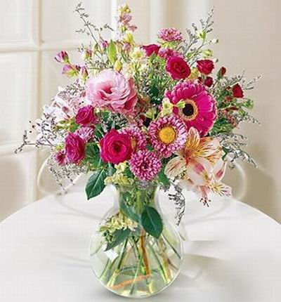 Mix of Roses, Carnations, Daisies, Alstromerias, Eustomas and greenery.