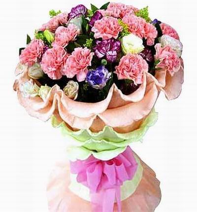12 pink and 5 white Carnations with greenery.