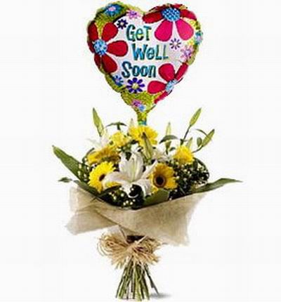 3 white Lily buds, 3 Sunflowers, 3 Roses with Baby's Breath and a helium balloon. If balloons are unavailable it will be substituted with a 15cm teddy bear.