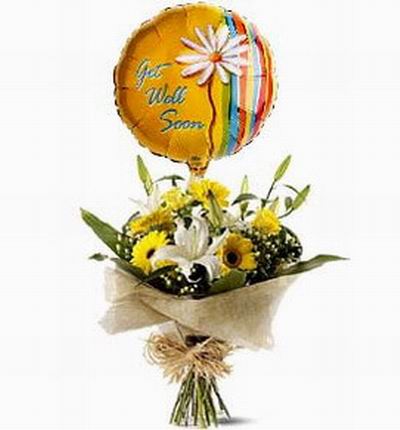 3 white Lily buds, 3 Sunflowers, 3 Roses with Baby's Breath and a helium balloon. If balloons are unavailable it will be substituted with a 15cm teddy bear.