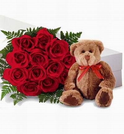 12 roses in gift box with 20cm teddy bear. Teddy bears may vary based on availability and if no box is available a vase will be substituted.