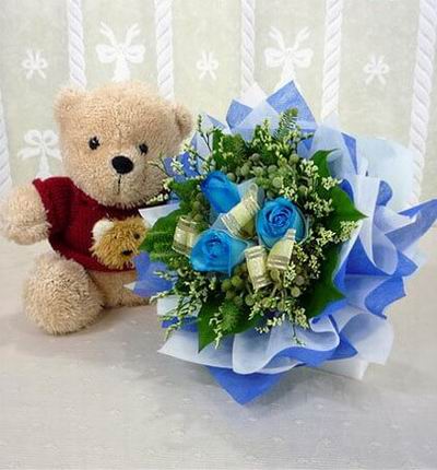 3 blue rose bouquet with a 20cm teddy bear. Teddy bears may vary based on availability.