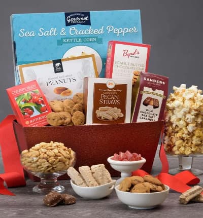 This delightful combination of sweet and salty treats is guaranteed to please! Perfect for a birthday, housewarming, or just because, awaken their palate with this scrumptious assortment of cookies, popcorn, chocolates, hard candies and much more!

Includes:
* Sea Salt & Cracked Pepper Kettle Corn - 4.2 oz.
* Roasted & Salted Peanuts - 2 oz.
* Peanut Butter Chocolate Chip Cookies - 2 oz.
* Milk Chocolate Sea Salt Caramels - 1 oz.
* Cinnamon Pecan Straws - 1 oz.
* Cherry Buds Hard Candies - 1.75 oz.
