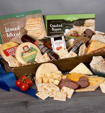 Bigger and better than ever, this deluxe gourmet sampler is packed with all of your favorites! We've included everything from garlic sausage, to sea salt and cracked pepper crackers, the perfect assortment of savory, spicy and sharp cheeses, and sun dried tomatoes bound to light up your lucky recipient's face!

Includes:
* Stoned Wheat Crackers - 4 oz.
* Sea Salt & Cracked Peppercorn Water Crackers - 4 oz.
* Summer Sausage - 5 oz.
* Garlic Sausage - 5 oz.
* Smoked Gouda Cheese - 6 oz.
* Cheddar Cheese - 6 oz.
* Sun Dried Tomato Bruschetta - 7.9 oz. oh