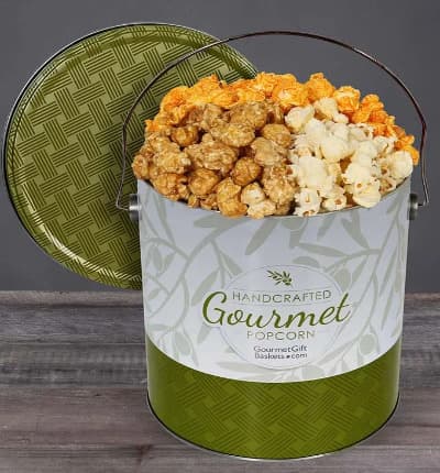 This delicious tin is perfect for snacking alone or together. We've combined our favorite flavors into one delicious masterpiece that you're sure to love! Tempting cheesy goodness, buttery sweet caramel, and classic rich and smoky kettle corn are waiting for you!

Includes:
* Popcorn Variety
* Kettle Cooked
* Cheesy Cheddar
* Caramel