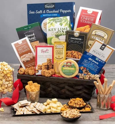 Unmatched in quality or value, this basket is a superb way to express thanks, congratulate, or send your heartfelt condolences. A stunning rustic basket is filled with a wide variety of crowd pleasers such as garlic summer sausage, rich cheddar cheese, zesty lemon wafer rolls, and sweet cinnamon pecan shortbread cookies.

Includes:
* Sea Salt & Cracked Pepper Kettle Corn - 4.2 oz.
* Stoned Wheat Crackers - 4 oz.
* Chichester Crunch Snack Mix - 2 oz.
* Roasted & Salted Peanuts - 2 oz.
* Blueberry Pomegranate Trail Mix Crunch - 1 oz.
* Jalape隳 Monterey Jack Cheese - 6 oz.
* Lemon Wafer Rolls - 3 oz.
* Key Lime Cookies - 4 oz.
* Vanilla Wafer Rolls - 4.4 oz.
* Peanut Butter Chocolate Chip Cookies - 4 oz.
* Cinnamon Pecan Straws - 3.5 oz.
* Cheese Straws - 4 oz.
* Garlic Sausage - 5 oz.
* Almondina Biscuits - 4 oz.