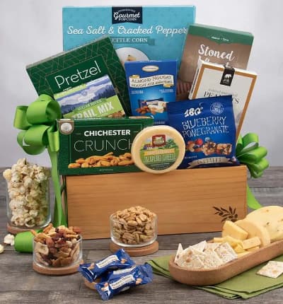 Looking for some wholesome goodies to keep them feeling well? We've got you covered! This delicious treasure trove of trail mix, nuts, cheese, crackers, and popcorn is a scrumptious care package that they're sure to appreciate.

Includes:
* Pretzel Twists - 3 oz.
* Chichester Snack Mix - 2 oz.
* Roasted & Salted Peanuts - 2 oz.
* Earl Grey Tea - 8 sachets
* Garlic Cheese - 2 oz.
* Sea Salt & Cracked Pepper Kettlecorn - 4 oz.
* Stoned Wheat Crackers - 4 oz.
* Blueberry Pomegranate Trail Mix Crunch - 1 oz.
* Cranberry Orange Tea - 8 sachets
* Almond Cashew Clusters with Pumpkin Seeds - 1 oz.