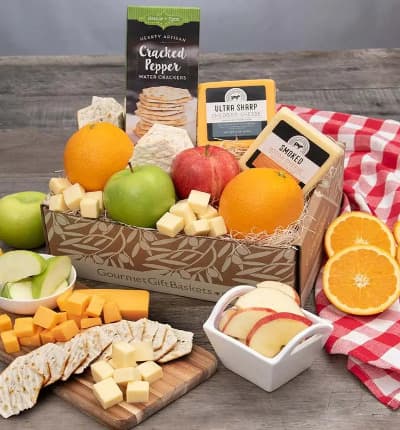 We've put together the perfect, thoughtful, pick-me-up basket. Universally beloved fresh fruit, smoky sausage, sharp cheddar cheese, with salt & pepper water crackers, can be enjoyed in blissful snacking harmony. No matter who you're shopping for, they're sure to love this wholesome, decadent, box of natural abundance.

Includes:
* Oranges - 2 ct.
* Apples - 2 ct.
* Sea Salt & Cracked Peppercorn Water Crackers - 4 oz.
* Cheddar Cheese - 6 oz.
* Smoked Gouda Cheese - 6 oz.