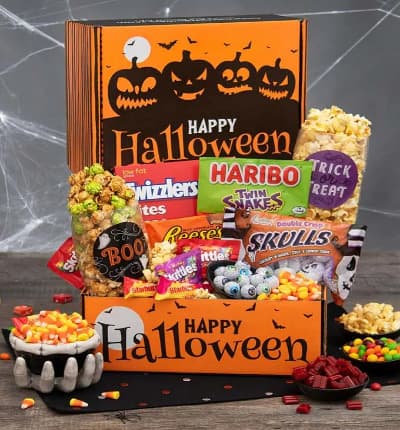 Halloween is here, and we've got some tricks and treats up our sleeve! Our Happy Halloween Candy Box is decorated with ominous, spooky jack-o-lanterns, but the inside is filled with nothing but treats such as scrumptious razzles, sweet and sour lemonheads, cheesy popcorn and traditional kettle corn, Reese's cups, and even more of their favorites! Make this Halloween one they will never forget by surprising them with this festive box of goodies!

Includes:
* Rainbow Nerd Theater Box - 5 oz.
* Milk Chocolate M&Ms Theater Box - 3.1 oz.
* Cheesy Cheddar Popcorn - 1.3 oz.
* Sea Salt & Cracked Pepper Kettlecorn - 1.3 oz.
* Reese's Peanut Butter Cups - 1.5 oz.
* Milk Duds Theater Box - 5 oz.
* Lemonheads Theater Box - 5 oz.
* Razzles Theater Box - 1.4 oz.
* Sweedish Fish Theater Box - 3.1 oz.
* Halloween Themed Gift Box