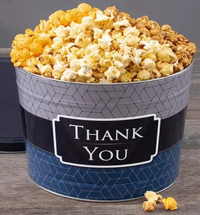 Send your thanks in a way they're sure to appreciate! This elegant gifting tin is popping with scrumptious cheddar, classic kettle, and sweet caramel popcorn flavors. Thank you has never tasted so good!

Includes:
* Popcorn Variety
* Kettle
* Caramel
* Cheddar
* Thank You Tin